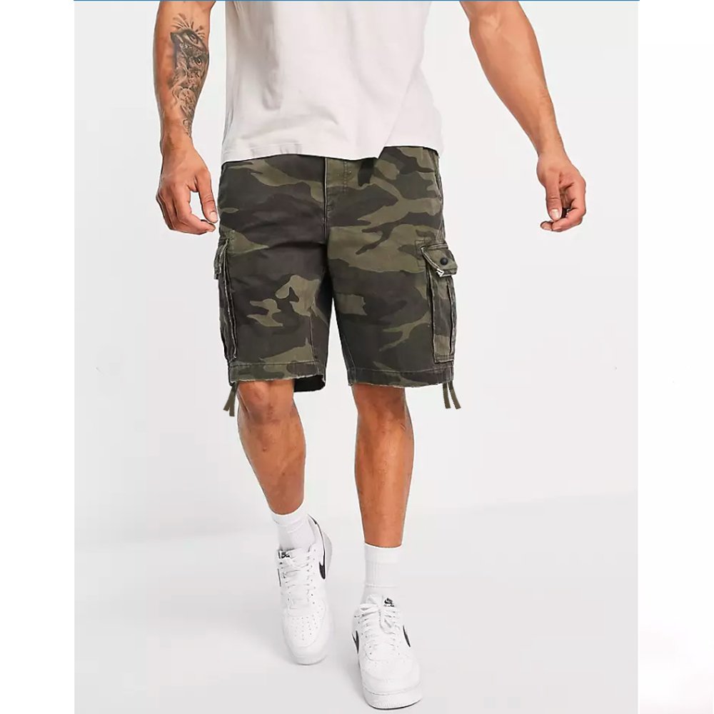como-short.jpg Oversized Cargo Shorts In Camo Green - Image 1